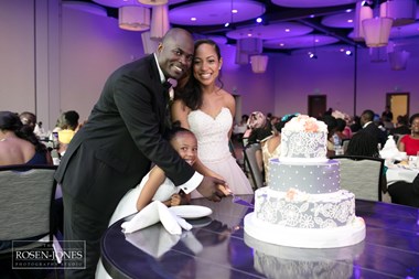 Bride and Groom Cutting a 3 Tier Cake - Oberlin Ohio Wedding in The Hotel at Oberlin