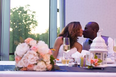 Bride and Groom Share a Kiss at Wedding Reception - Ohio Wedding in Oberlin