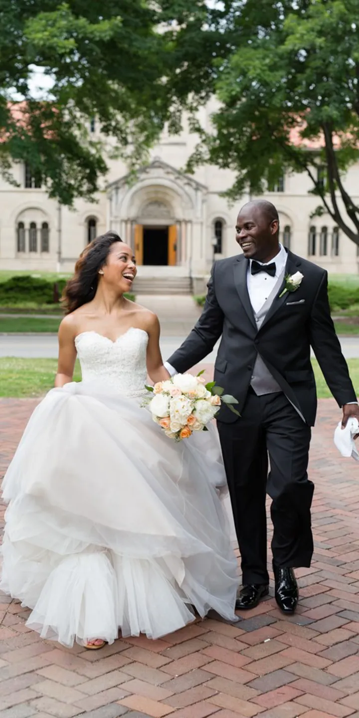 Newlyweds walking while looking lovingly at each other