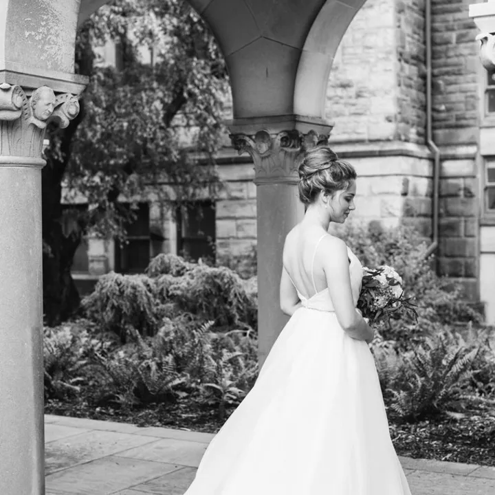 Black and white photo of a bride on her wedding day at The Hotel at Oberlin